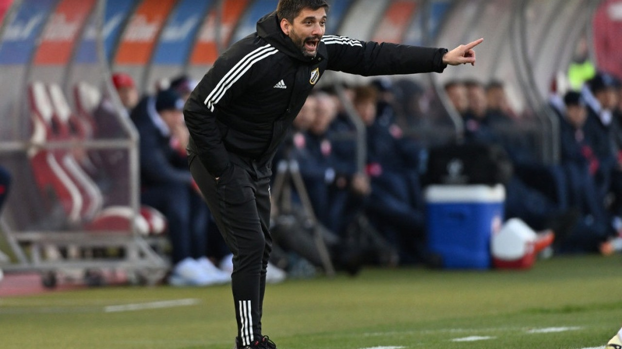 Marko Savic gives instructions from the side of a football pitch