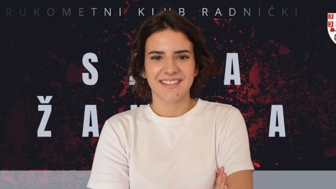 Sara Zakula poses in front of the Radnicki club background