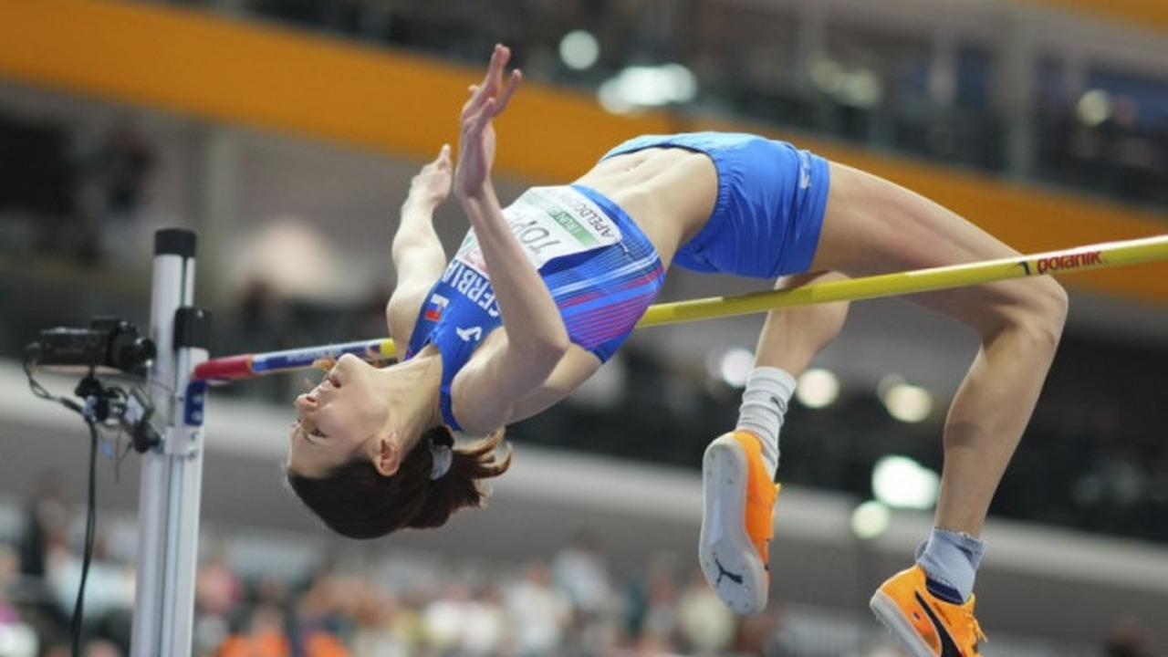 Angelina Topic clears the high jump bar in Serbia colours
