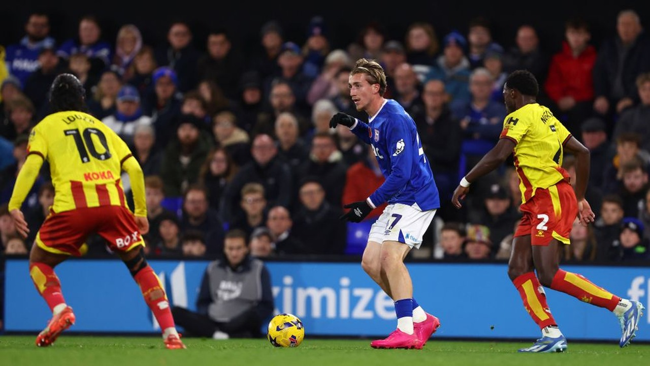 An Ipswich Town player carries the ball during a home match