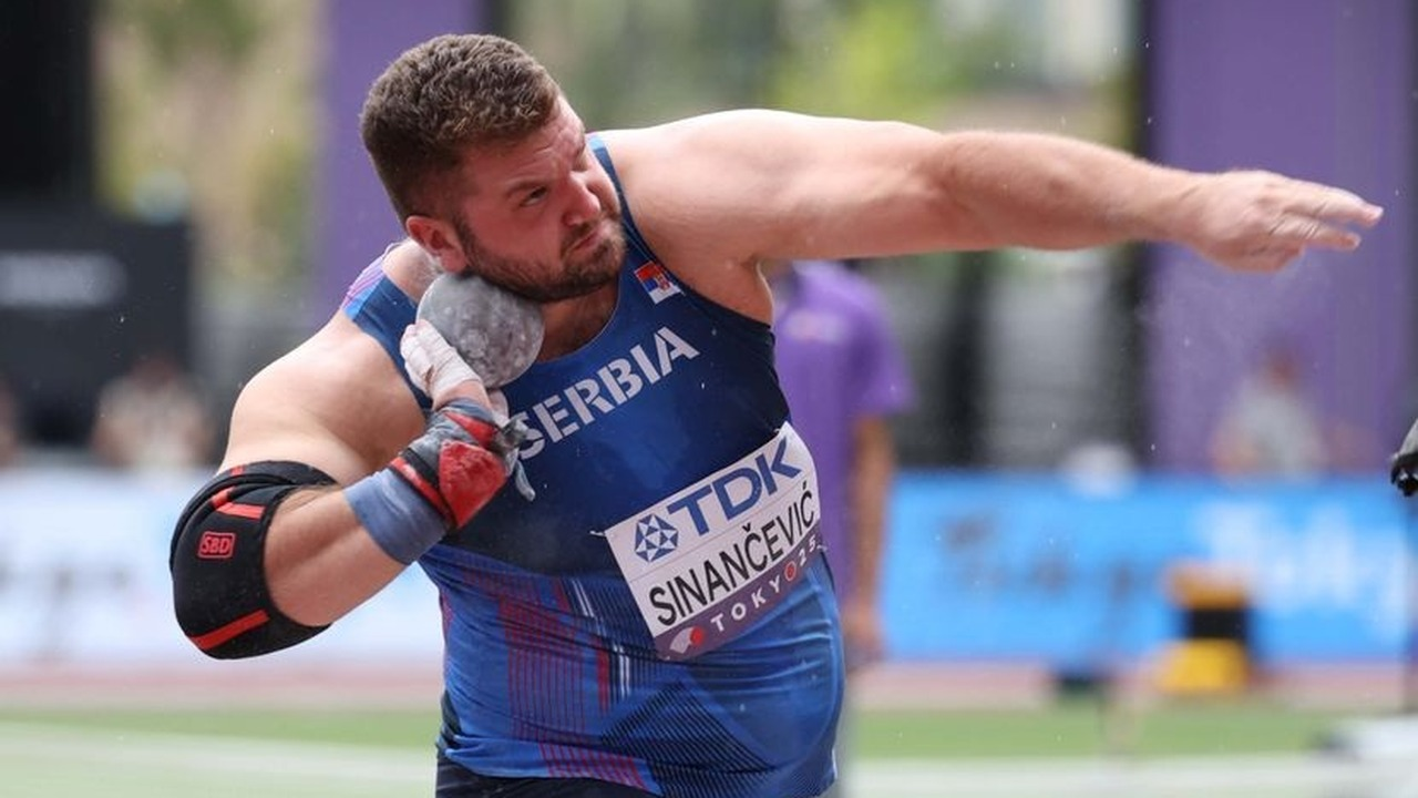 Armin Sinancevic prepares a shot put throw in Serbia colours