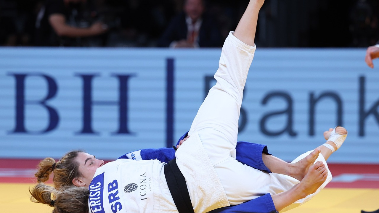 Marica Perisic grips her opponent during a judo contest