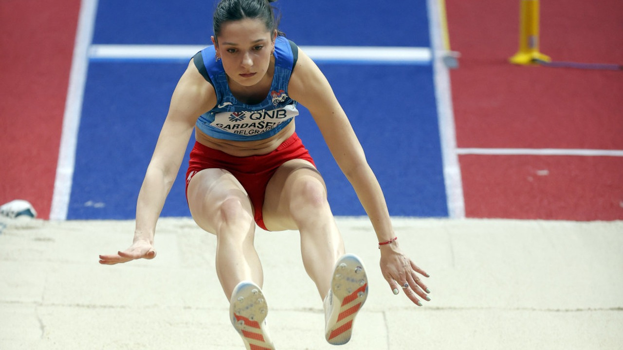Milica Gardasevic runs during a long jump attempt
