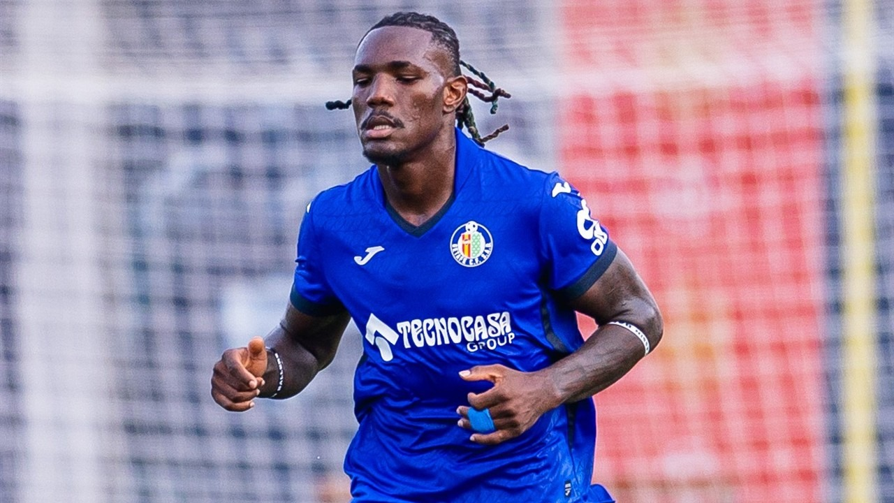 A Getafe player runs during a match