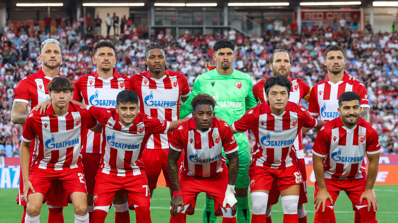 Red Star players pose together before a match