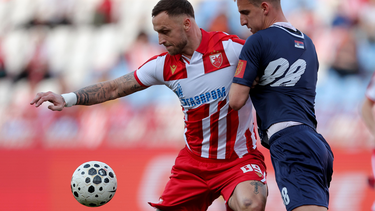 Red Star players compete during a Serbian league match