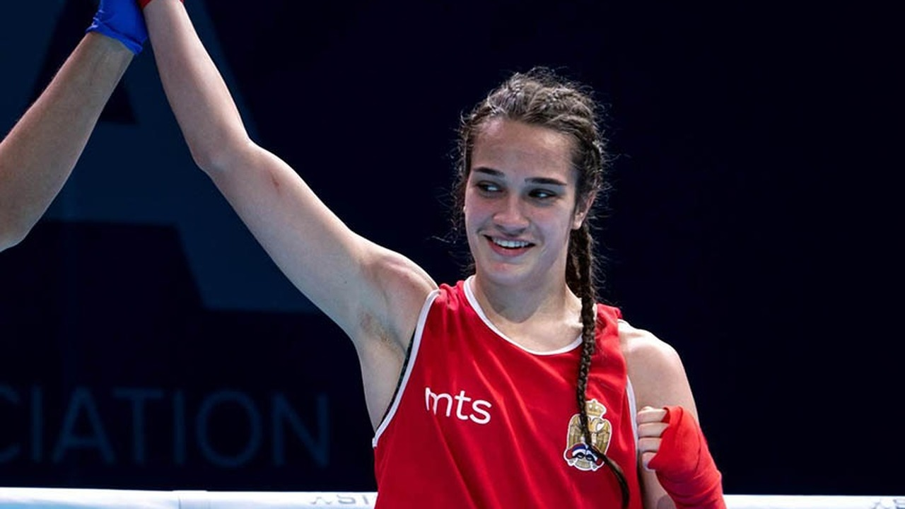 Sara Cirkovic raises her arm after a boxing match