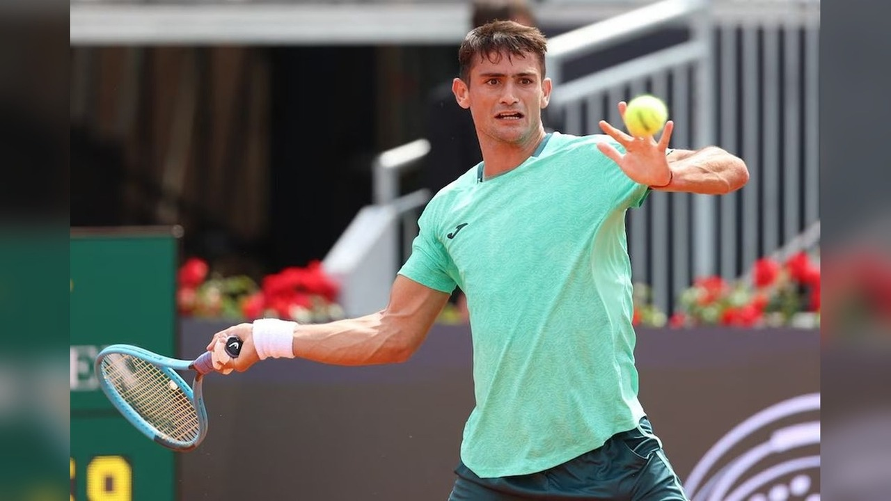 Mariano Navone plays a forehand during a hard-court match