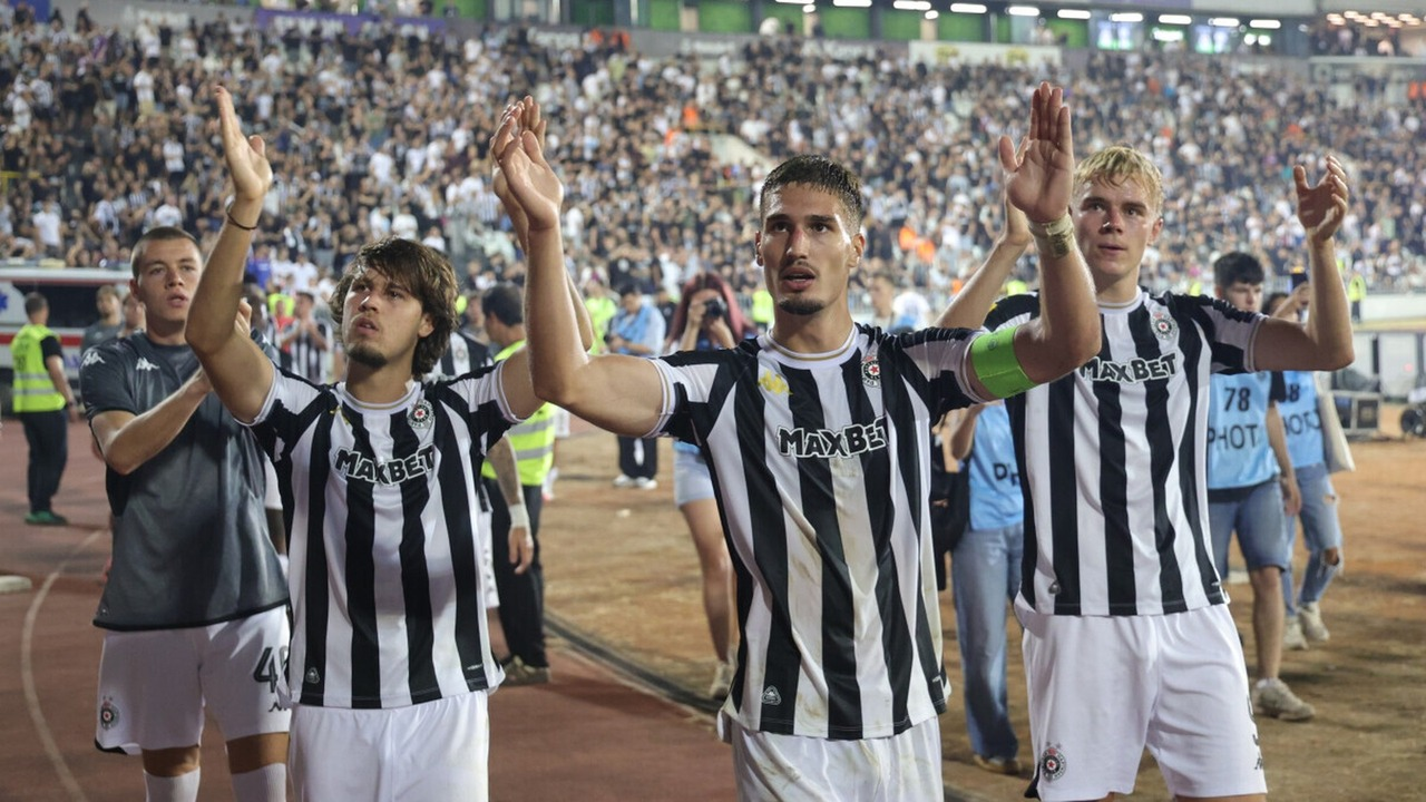 Partizan players thank the home supporters after the Getafe match