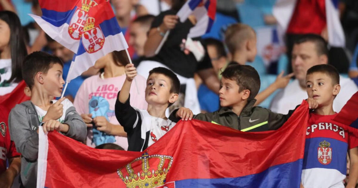 Young Serbia supporters in the stands. FSS photograph accompanying the invitation to organised children's groups.