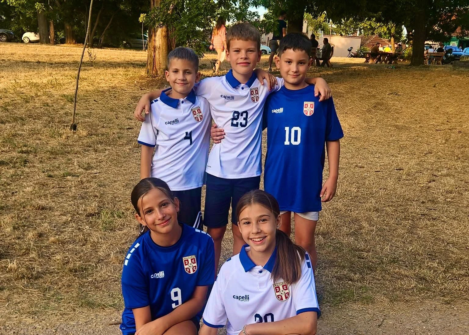 Young supporters in Serbia shirts from the federation's September campaign.