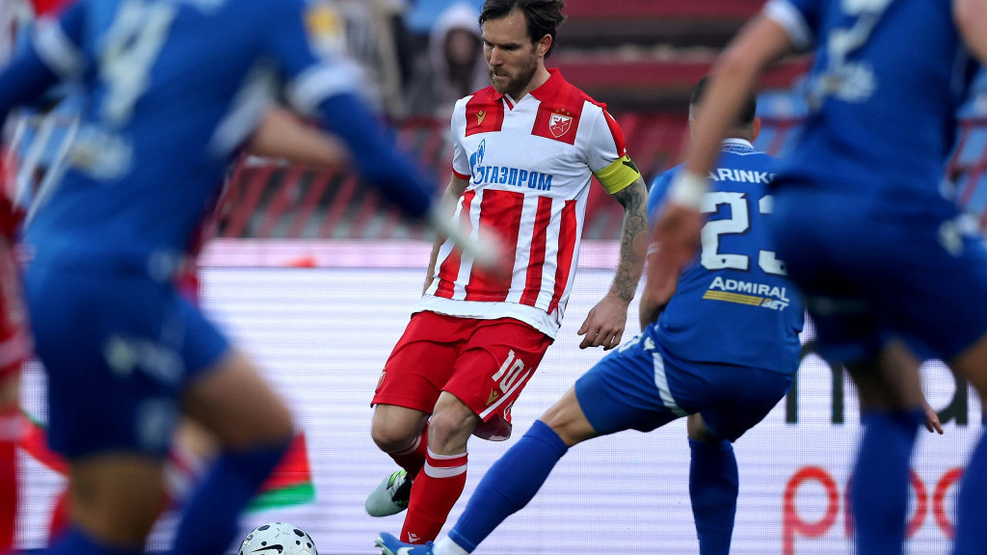 Aleksandar Katai carries the ball against Novi Pazar defenders