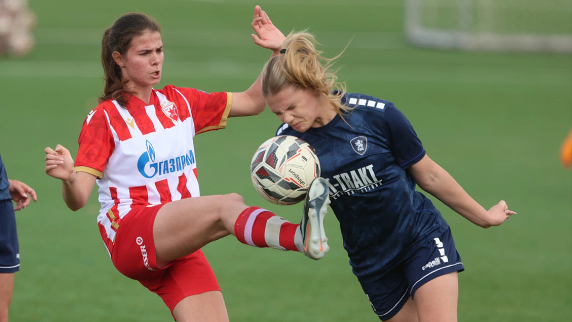Crvena zvezda and TSC players challenge for the ball in the women's league