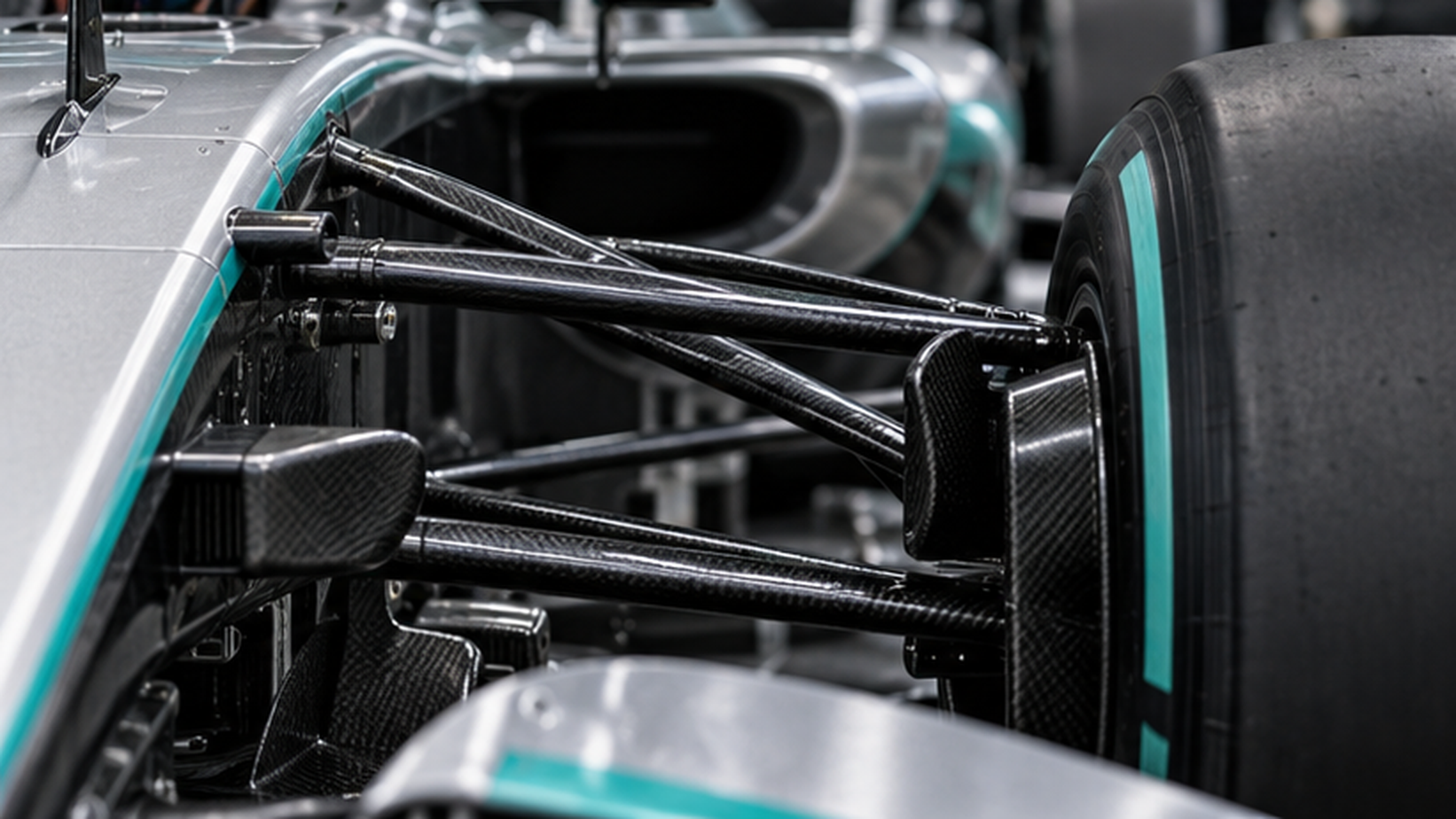 Ilustracija Formule 1: detalj trkačkog automobila u garaži.